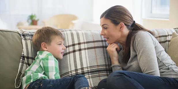 Mother is talking to his son