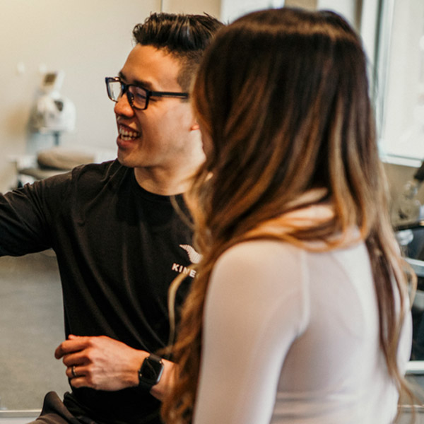 employee talking with patient